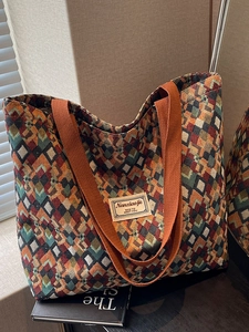 Large bohemian canvas tote bag with colorful geometric patterns and orange shoulder strap