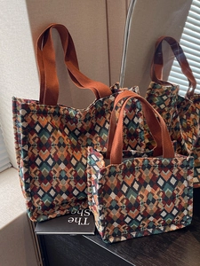 Bohemian geometric woven tote bag set with orange and blue diamond patterns in two sizes
