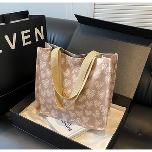 Canvas tote bag with heart print in a black gift box for casual everyday use