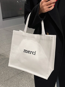 Borsa tote minimalista in tela bianca con stampa merci nera e doppi manici superiori