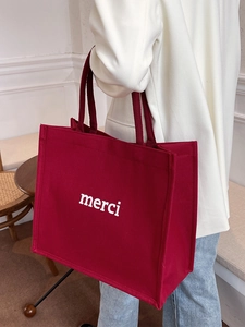 Grande borsa tote in tela bordeaux con stampa merci bianca per il tempo libero