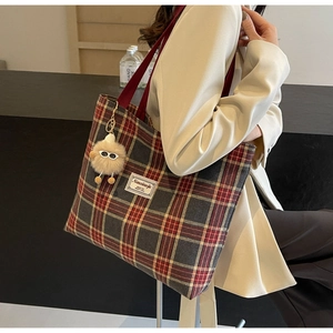 British style red plaid canvas tote bag with shoulder strap and plush charm detail