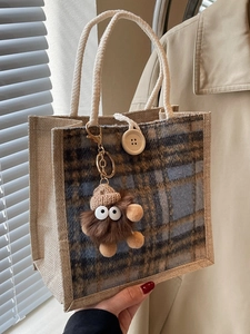 Linen plaid tote bag with khaki blue checkered pattern and cute brown monster charm