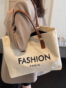 Große beige Canvas-Tragetasche mit braunen Ledergriffen und Fashion Paris Aufdruck für Damen