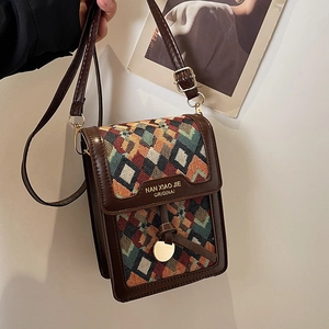 Vintage bohemian vertical crossbody phone bag with geometric woven pattern and brown trim