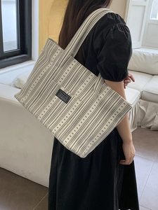 Large capacity canvas tote bag with ethnic black and white patterns for daily commute