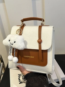 Minimalist felt and leather mini backpack in beige with cloud pendant and top handle