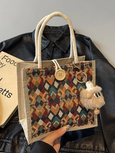 Ethnic jute tote bag with geometric tapestry patterns, wooden button and plush sheep charm