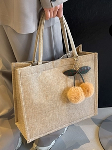 Minimalist high-capacity linen tote bag for students featuring a cute cherry plush charm