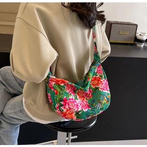 Detail of Chinese vintage floral tote bag featuring peony patterns and crossbody strap