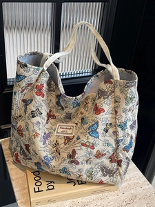 Large capacity canvas tote bag with colorful butterfly jacquard pattern and double handles