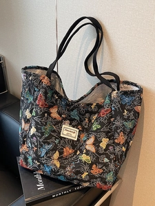 Large capacity canvas tote bag with colorful butterfly embroidery and black handles