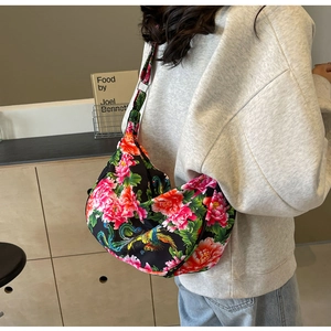 Detail of large capacity floral tote bag featuring traditional peony and phoenix patterns