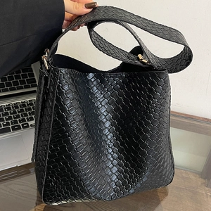Classic black woven leather bucket bag with wide shoulder strap for women