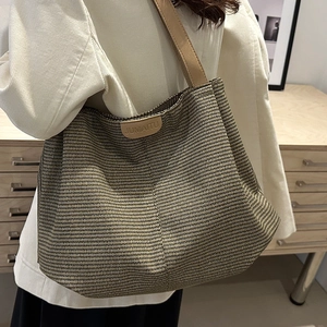 Large capacity striped woven tote bag with leather straps for daily commuting