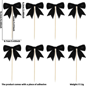 Detail view of 8 black satin bow cake toppers with precise dimensions 16.3x8.7cm