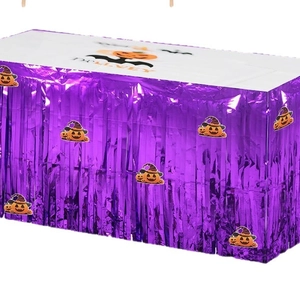 Purple Halloween foil fringe table skirt with pumpkin wizard hat stickers for party decor