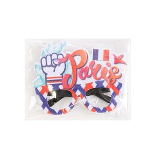 Paris themed party glasses with French flag design and artistic font in retail packaging