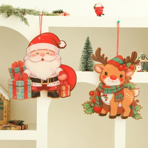 Hanging Christmas decorations featuring Santa Claus and reindeer cartoon charms on a white shelf
