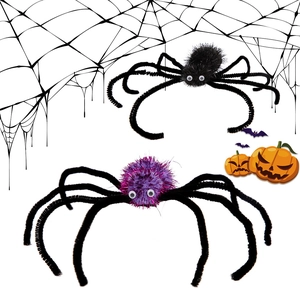 Detail of Halloween purple tinsel and black fuzzy spider hair clips with white eyes