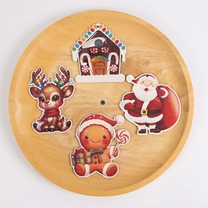 Cartoon wooden Christmas tree ornaments featuring Santa, reindeer, and gingerbread house