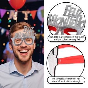 Detail of red New Year party glasses featuring silver Feliz Año Nuevo glitter lettering