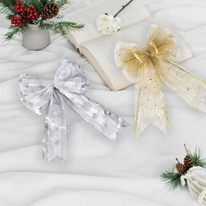 Gold and silver mesh Christmas bows with snowflake patterns for tree decoration