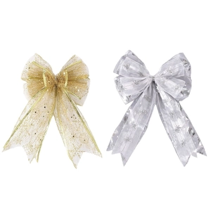 Sparkly gold and silver Christmas bow ornaments with snowflake and star patterns for tree decor