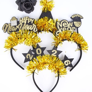 Set of 4 gold and black 2026 Happy New Year headbands with glitter stars and champagne cups