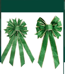 Close-up of green glitter St. Patrick's Day bows with elegant gold wired edges