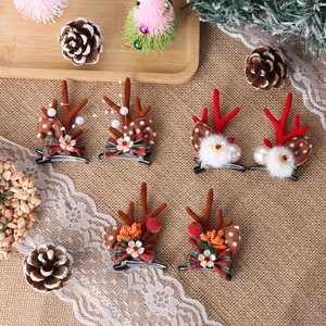 Christmas reindeer antler hair clips set with brown plush horns and festive bow ties