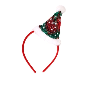 Feestelijke kerst hoofdband met een mini kerstmanmuts in rood en groen geruit patroon