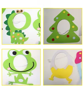 Detail view of felt animal masks showing dinosaur, Christmas tree, and frog designs for kids