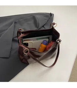 Deep brown matte leather tote bag with large capacity for daily commute essentials