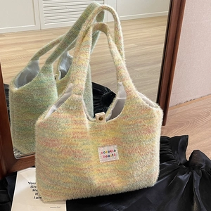 Colorful knitted fuzzy tote bag with soft macaron colors and metal buckle closure