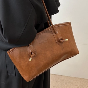 Large capacity vintage brown tote bag with knot handle detail and gold trim for women