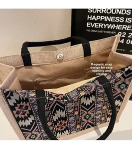 Linen tote bag interior with magnetic clasp, brown lining, and a functional zipper pocket