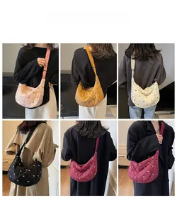 Collage of quilted crescent bags with bow embroidery in various autumn winter colors