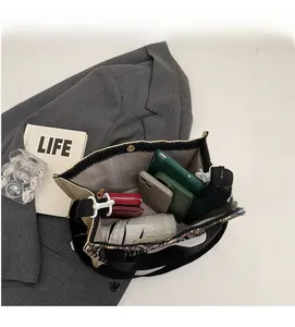 Top view of woven tote bag interior showing spacious storage for daily essentials