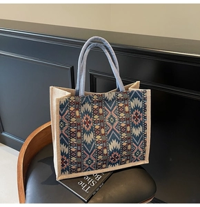 Detailed close-up of geometric pattern weave and durable rope handles on a linen tote bag