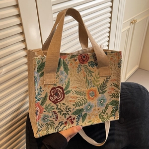 Floral knit linen tote bag with woven handles and crossbody strap in vintage cream finish