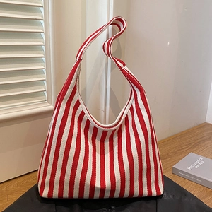 Large capacity red and white striped canvas tote bag with thick woven fabric and minimal design