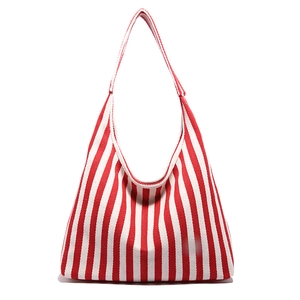 Large red and white striped canvas tote bag with spacious interior for daily travel