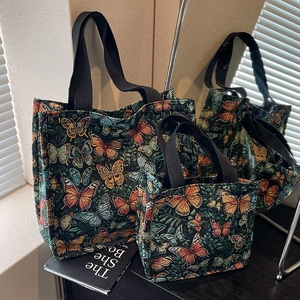 Retro large capacity tote bags with colorful butterfly jacquard pattern and black handles