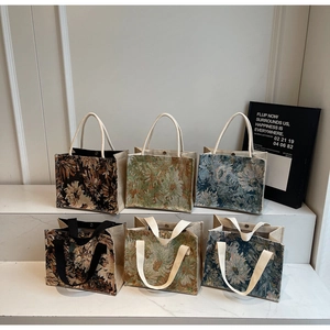 Detailed display of vintage floral jacquard tote bags in six diverse artistic patterns