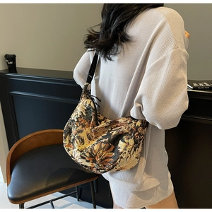 Close-up of vintage oil painting style jacquard tote bag with floral pattern details