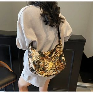 Detail of vintage oil painting floral embroidery on spacious hobo tote bag for women