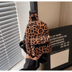 Detail of leopard print mini backpack with high-quality zipper pocket and black strap