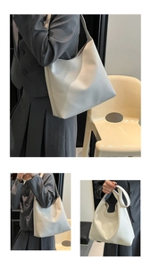Detailed shots of a minimalist cream-white large tote bag with smooth leather finish