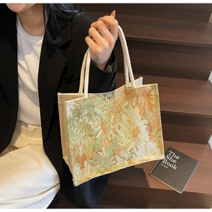 Detail shot of Monet style floral embroidery cotton linen tote bag with rope handles